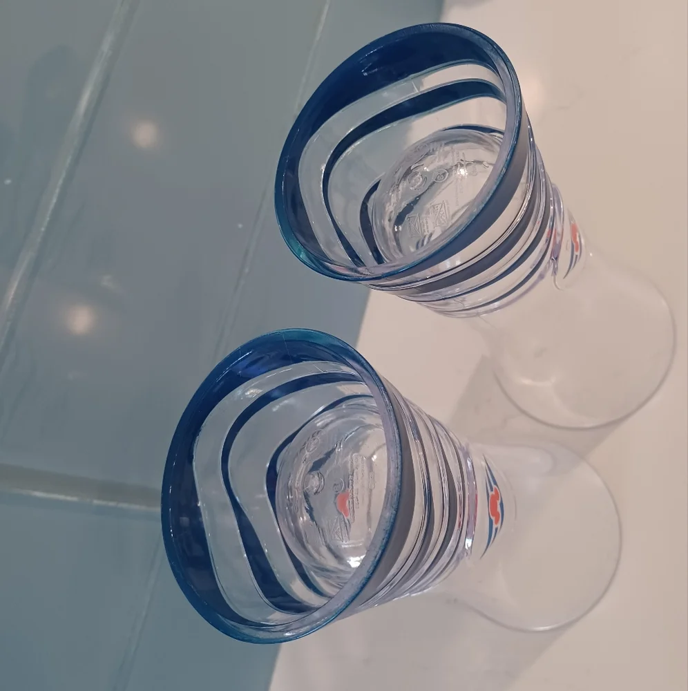 A pair of DCL souvenir cups
